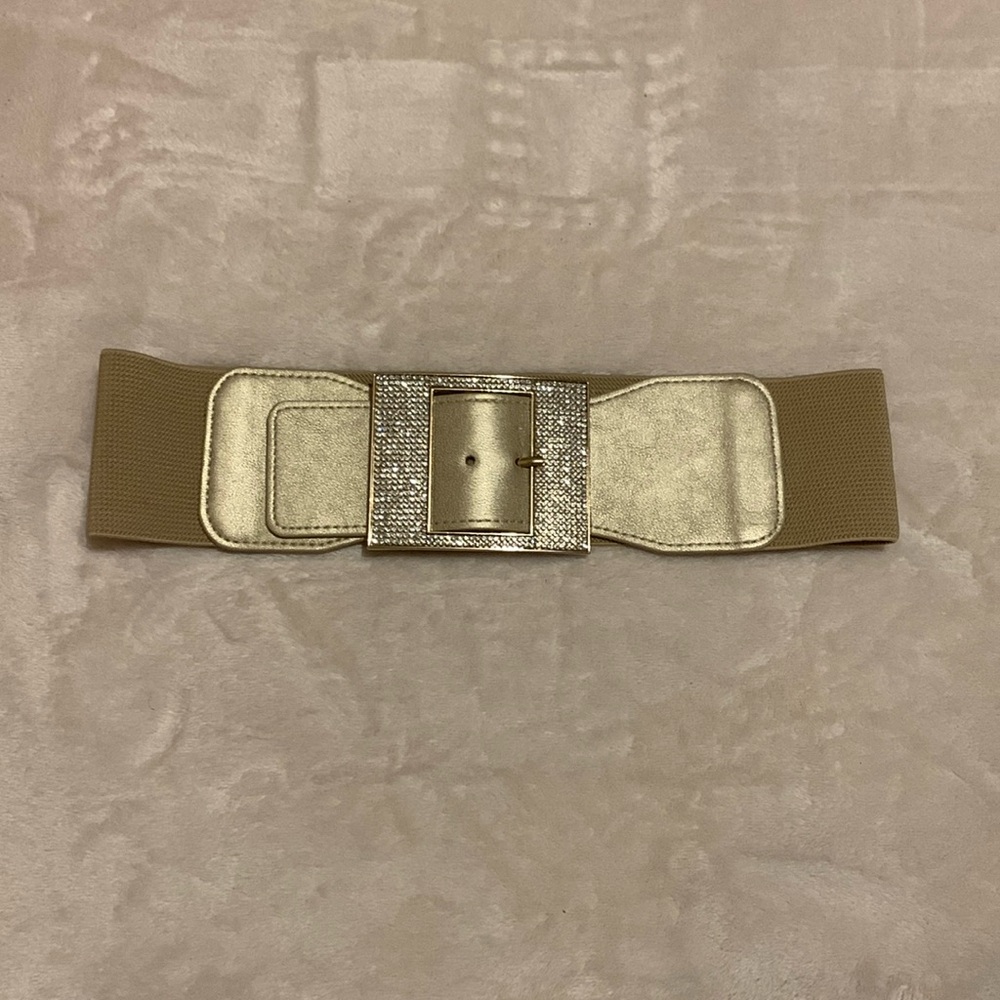 Women’s nude and gold belt